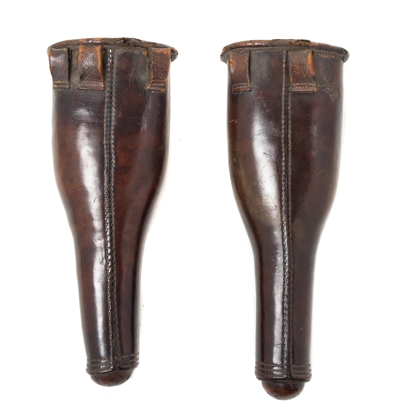 A Pair of English Leather Horse Holsters Height of tallest 14 inches.