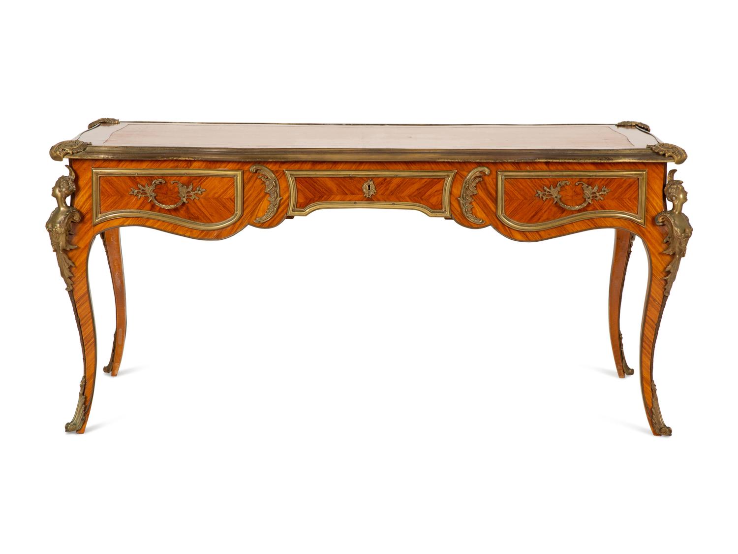 A Louis XV Style Gilt Bronze Mounted Tulipwood Bureau Plat