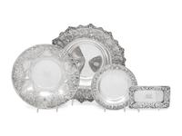 A Group of Four S. Kirk and Son Repousse Silver Table Articles