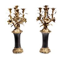 A Pair of Louis XV Style Gilt Metal Mounted Porcelain Five-Light Candelabra