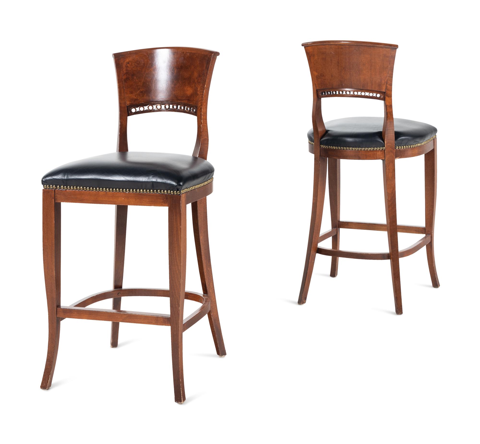 A Set of Four Burlwood Bar Stools