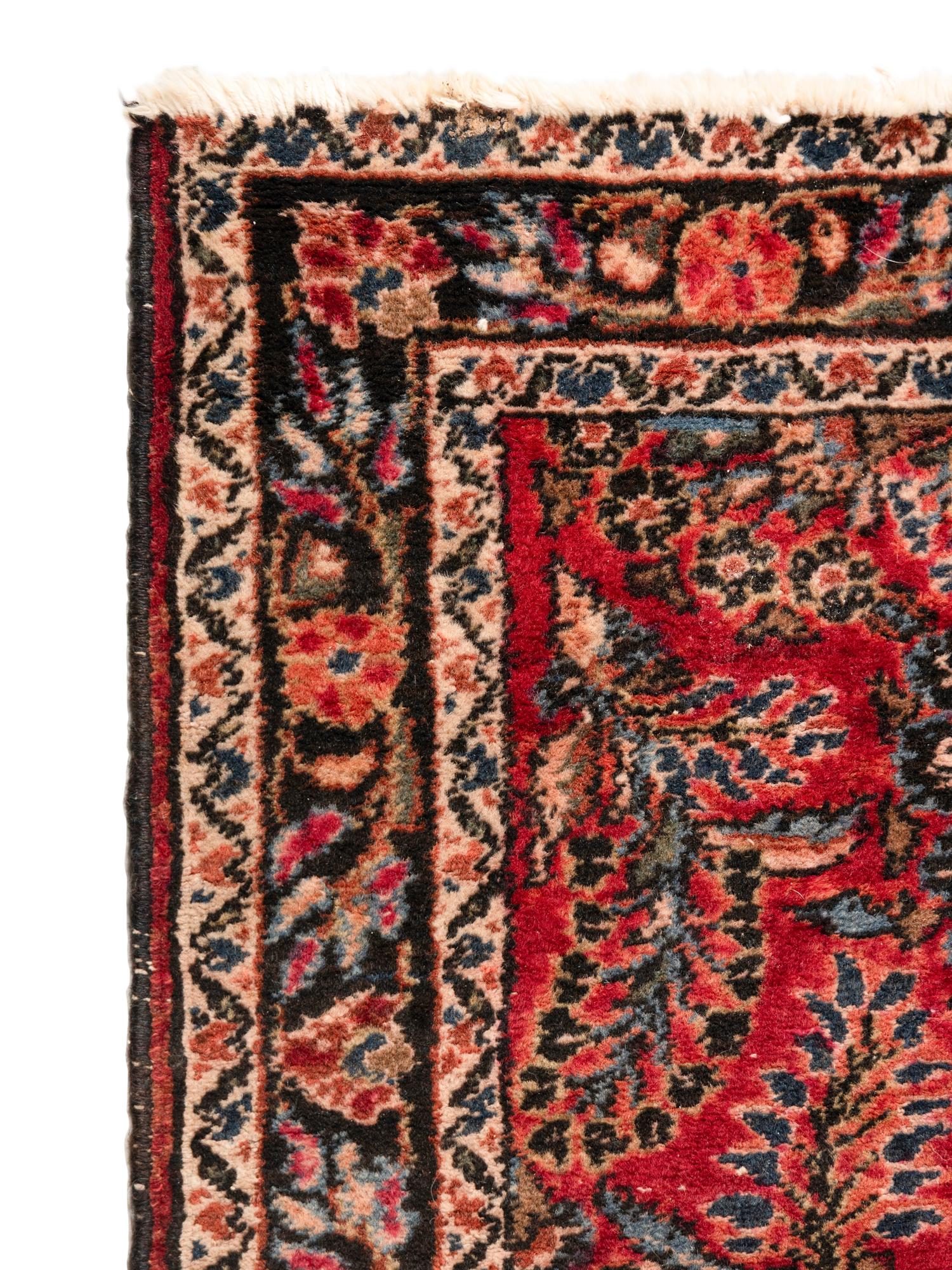 A Group of Three Small Rugs