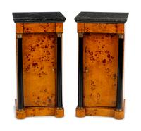 A Pair of Empire Style Parcel Ebonized Marble-Top Cabinets