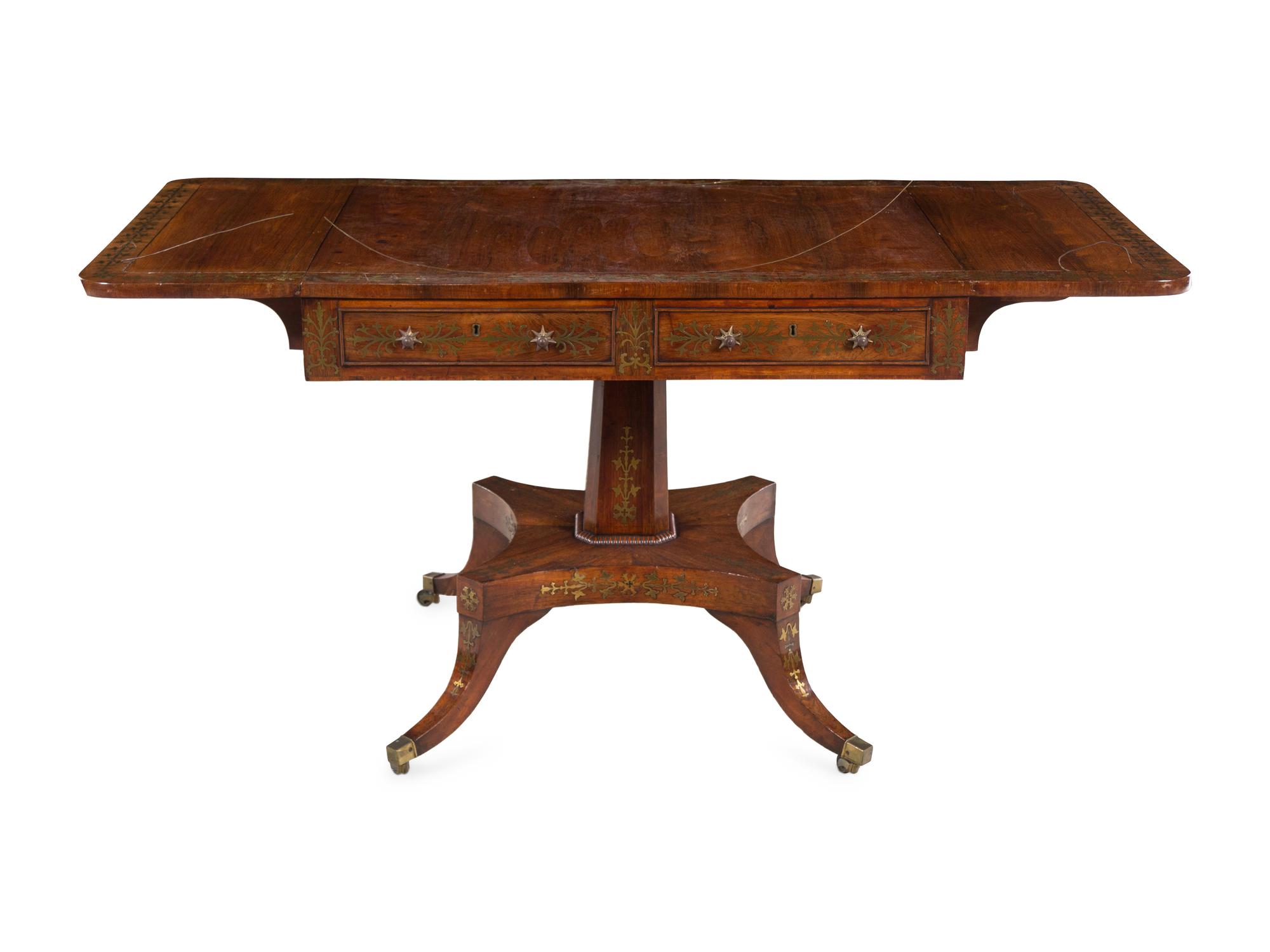 A Regency Brass Inlaid Rosewood Pedestal Sofa Table