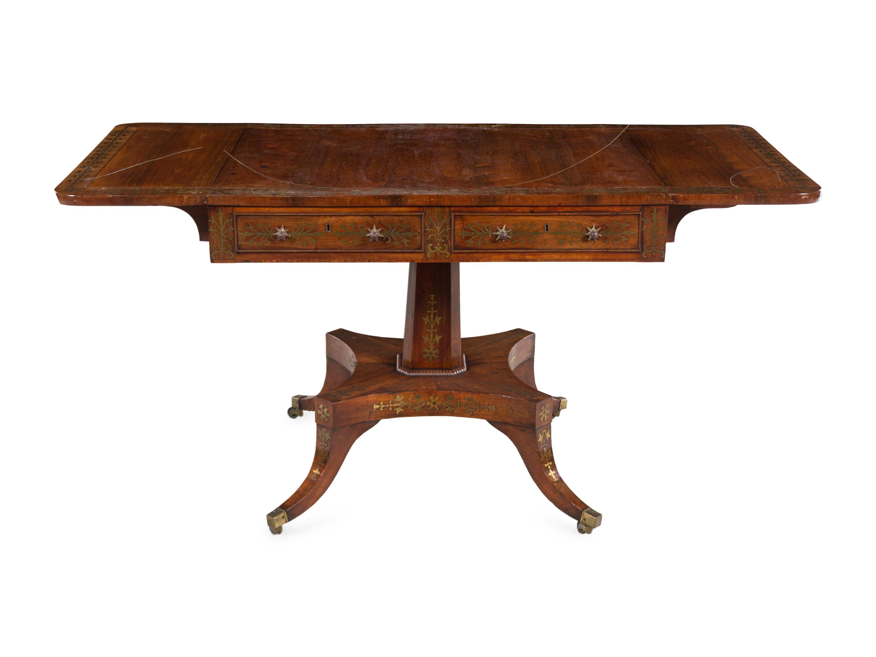A Regency Brass Inlaid Rosewood Pedestal Sofa Table