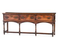 A Welsh Paneled and Turned Oak Sideboard
