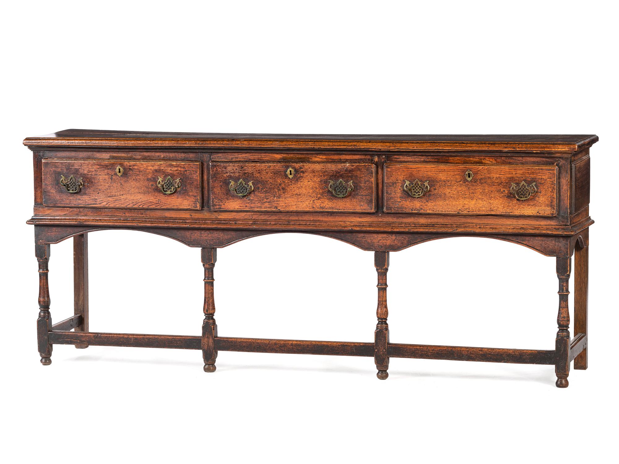 A Welsh Paneled and Turned Oak Sideboard