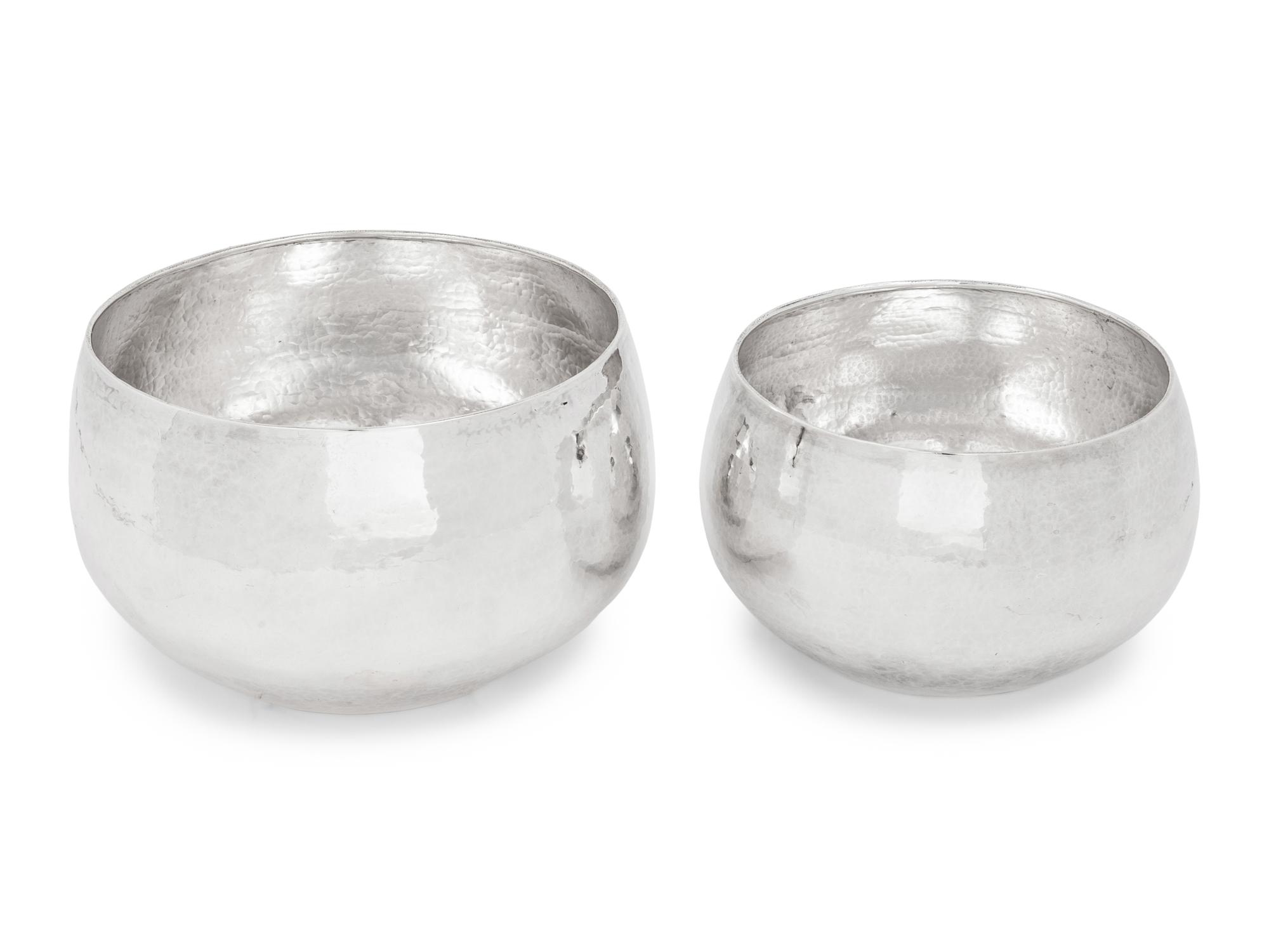 Two Silvered-Metal Hammered Vases