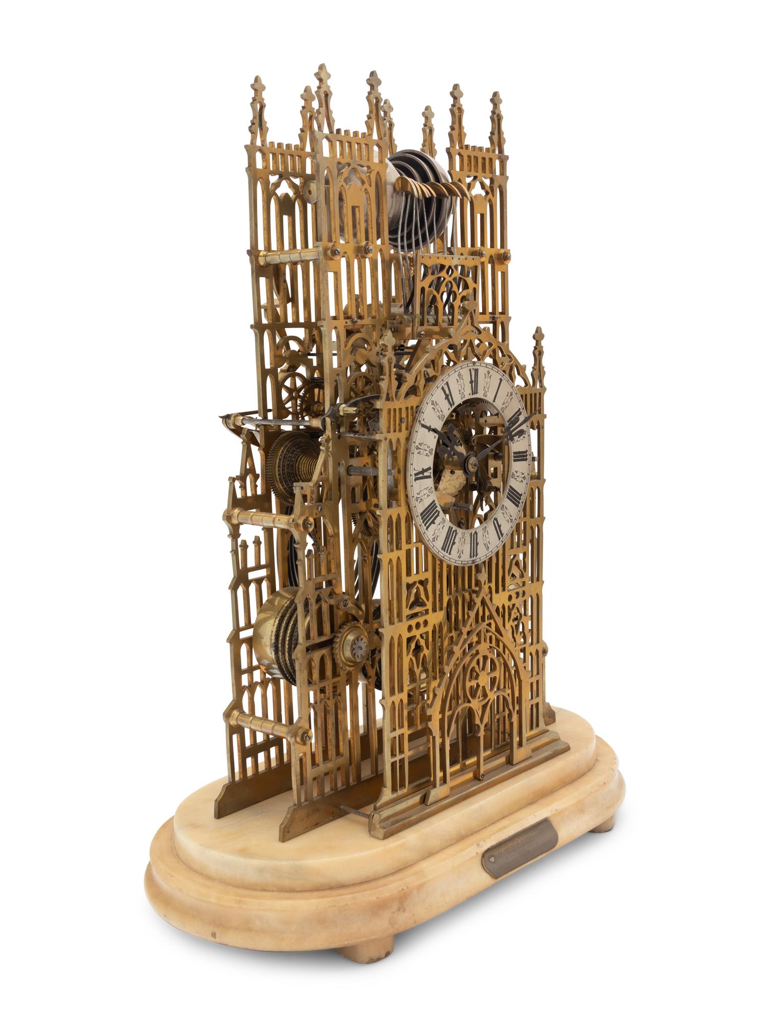 A Victorian Brass Cathedral-Form Skeleton Clock