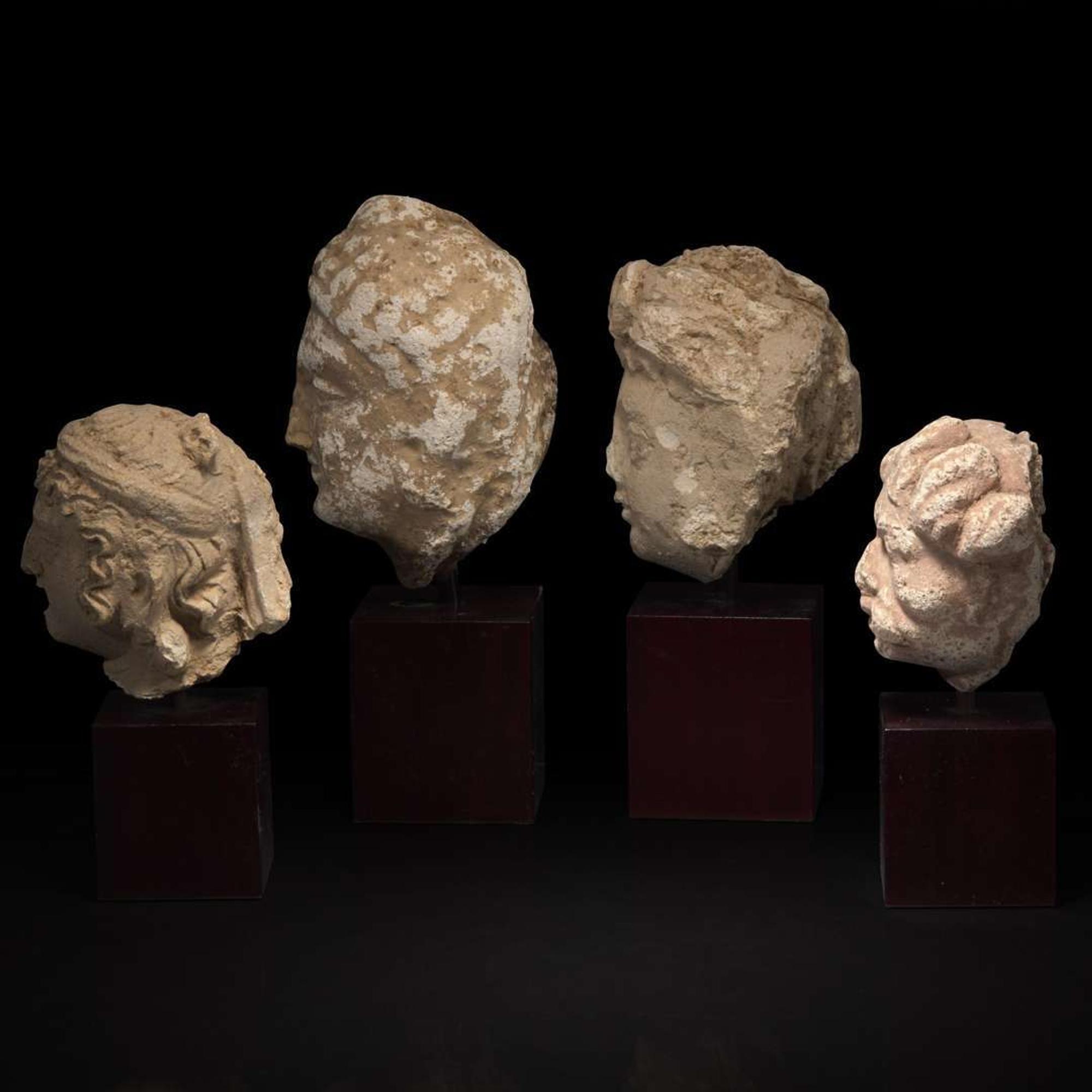 A group of four small stucco heads 石灰岩佛首一组四件 Gandhara, 4rd-5th Century ??? ?????