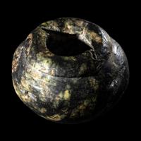 An Egyptian Serpentine Cosmetic Vessel