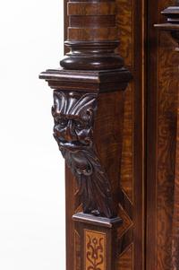 An Italian Baroque Walnut and Marquetry Cupboard