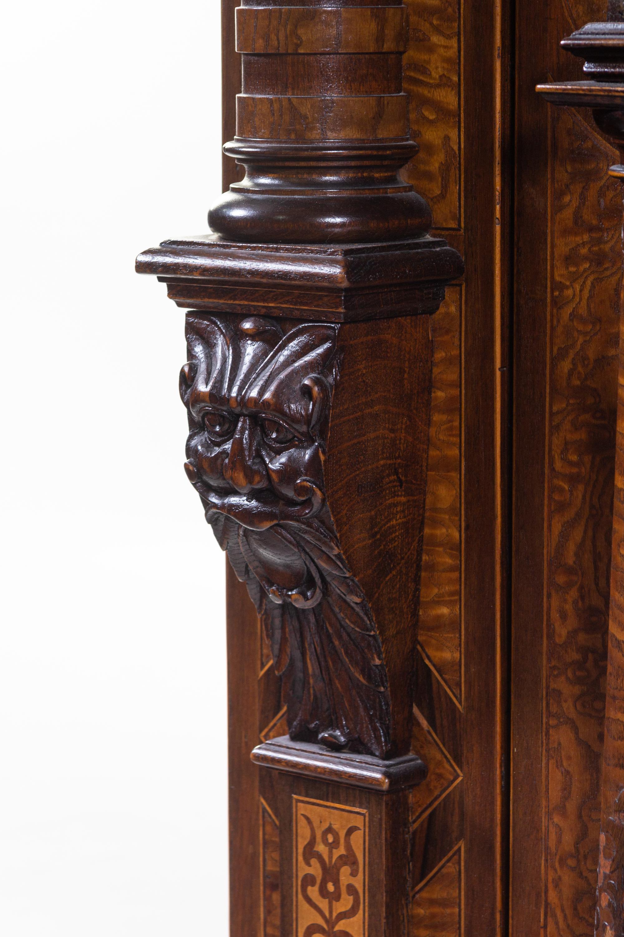 An Italian Baroque Walnut and Marquetry Cupboard