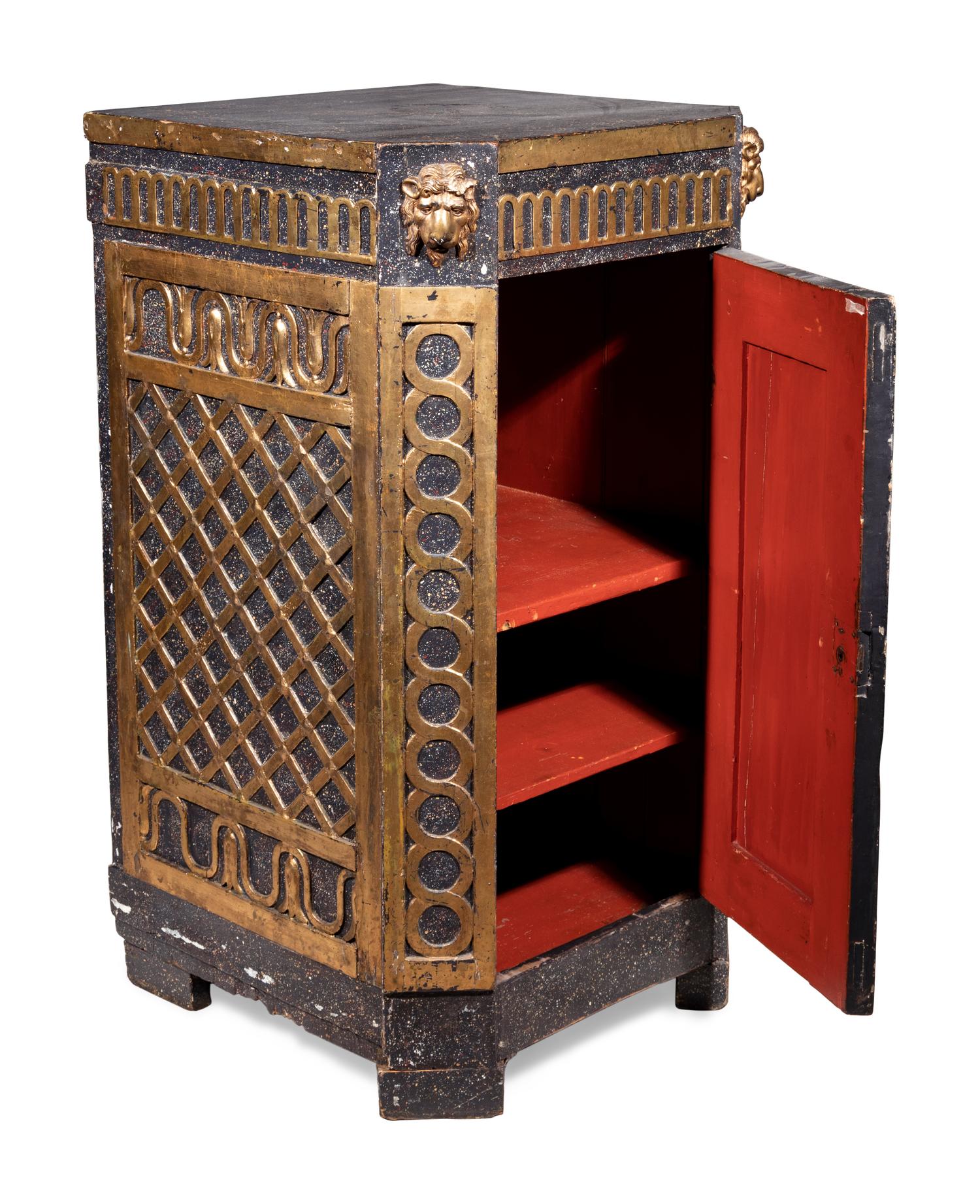 A Swedish Neoclassical Faux Porphyry and Parcel Gilt Pedestal Cabinet