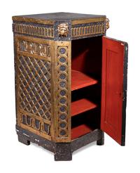 A Swedish Neoclassical Faux Porphyry and Parcel Gilt Pedestal Cabinet
