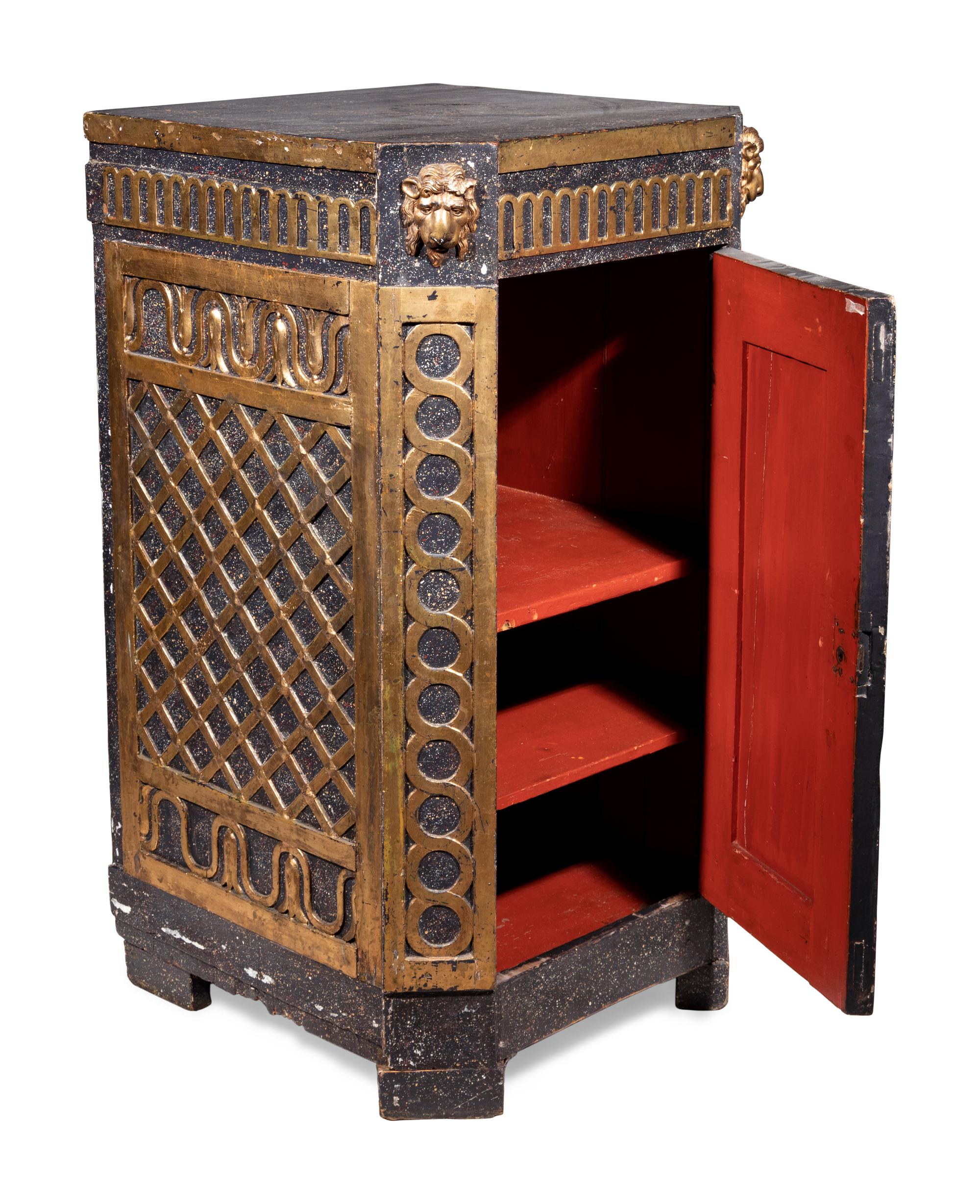 A Swedish Neoclassical Faux Porphyry and Parcel Gilt Pedestal Cabinet
