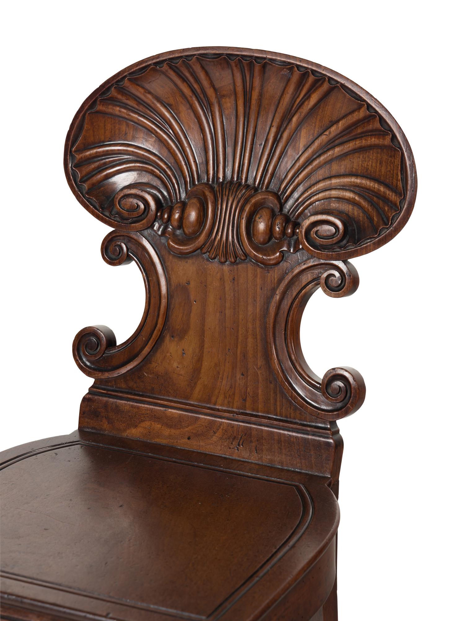 A Pair of Regency Mahogany Hall Chairs