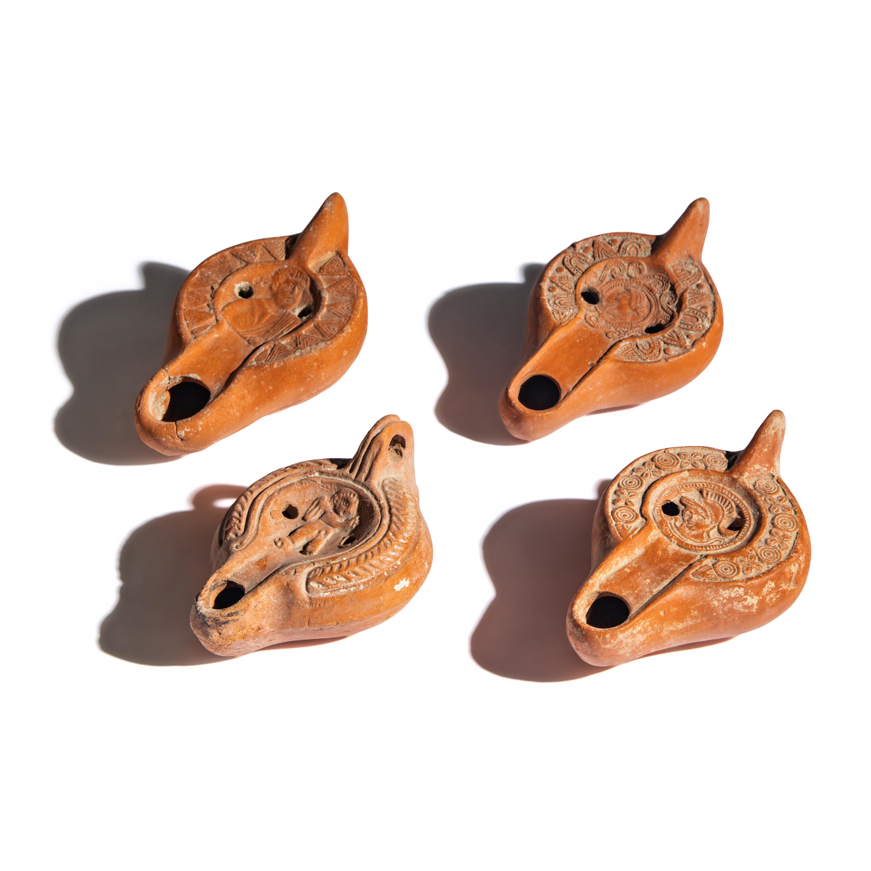 Four Roman Terracotta Lamps