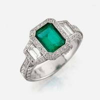 An emerald, diamond, and platinum ring, JB Star