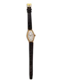 PATEK PHILIPPE, 18K YELLOW GOLD 'TONNEAU' WATCH