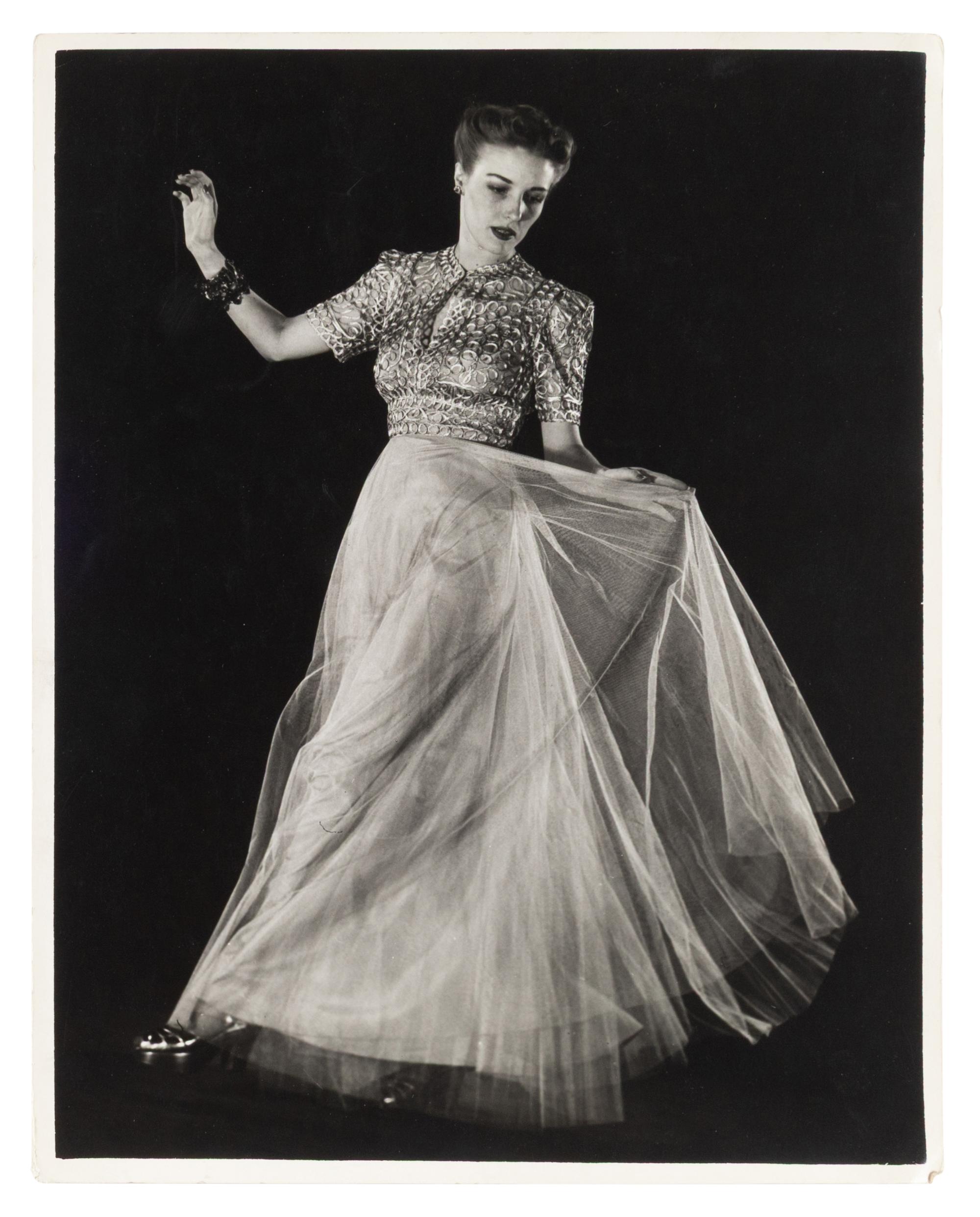 Model wearing evening dress of net skirt with silver metal bodice and Model wearing gold brocade evening dress (two works), 1938; printed ca. 1938
