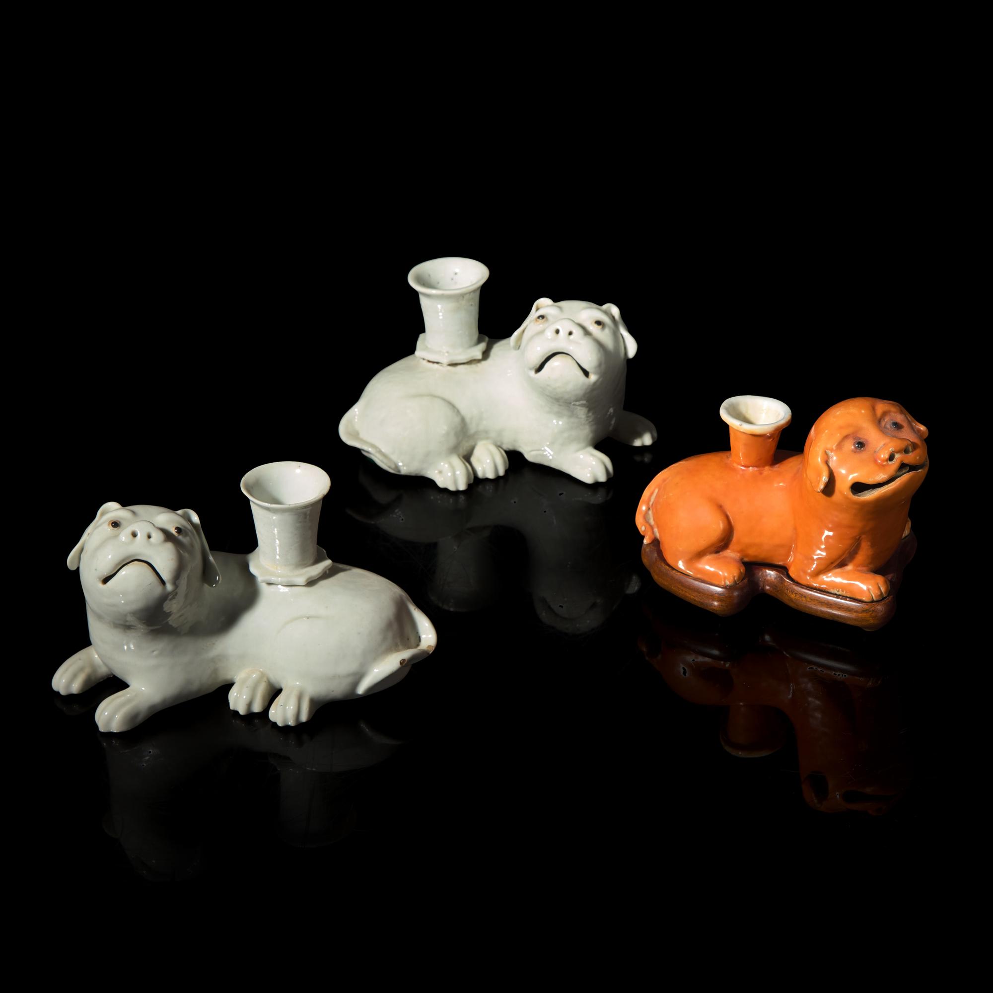 Three Chinese Export Porcelain Dog Candleholders, 19th Century 清晚期 外銷臥犬燭臺三件