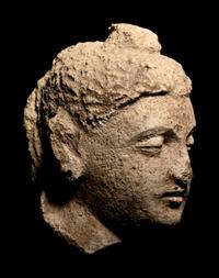 Four Gandharan Fragmentary Stucco Heads and One Bust
