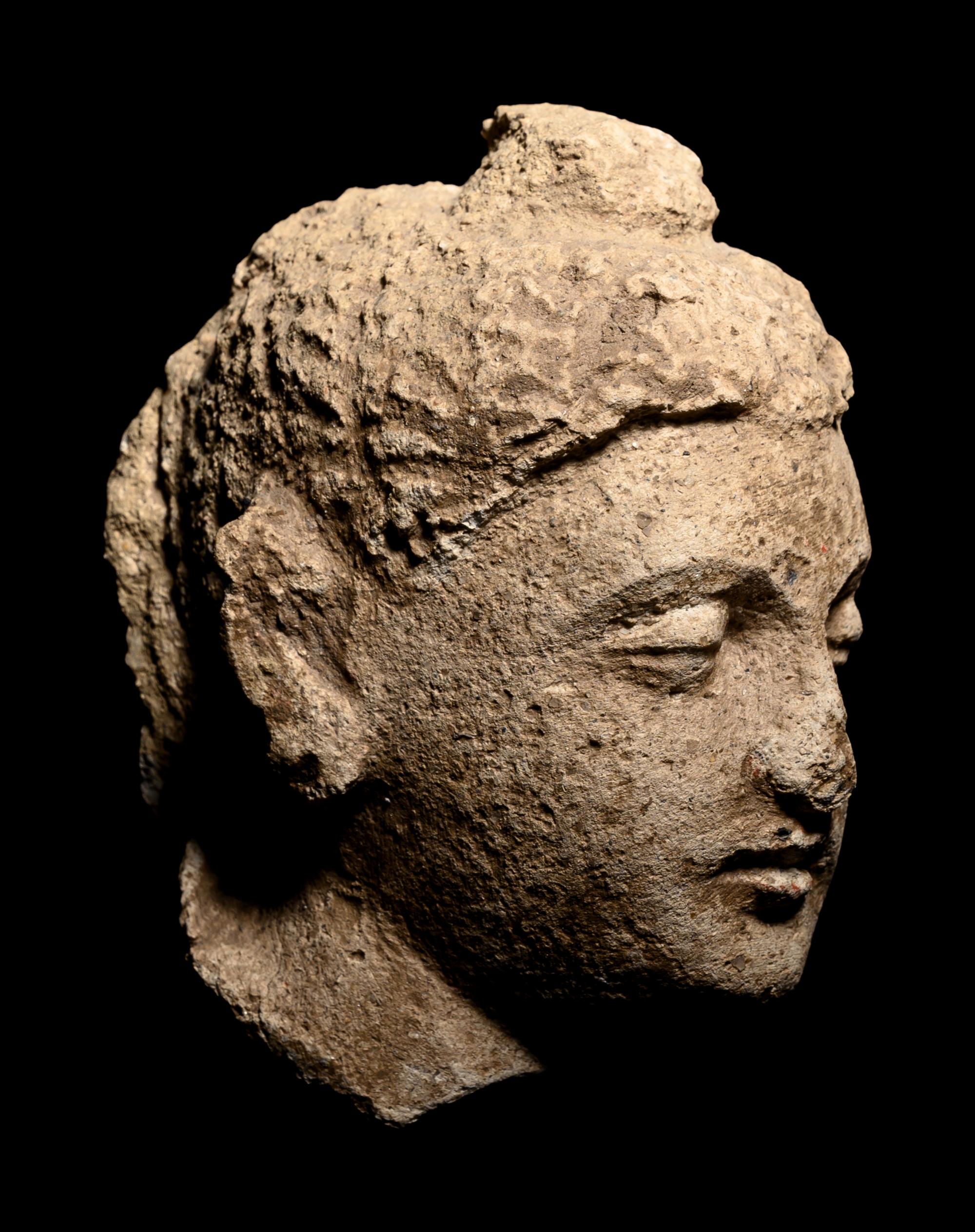 Four Gandharan Fragmentary Stucco Heads and One Bust