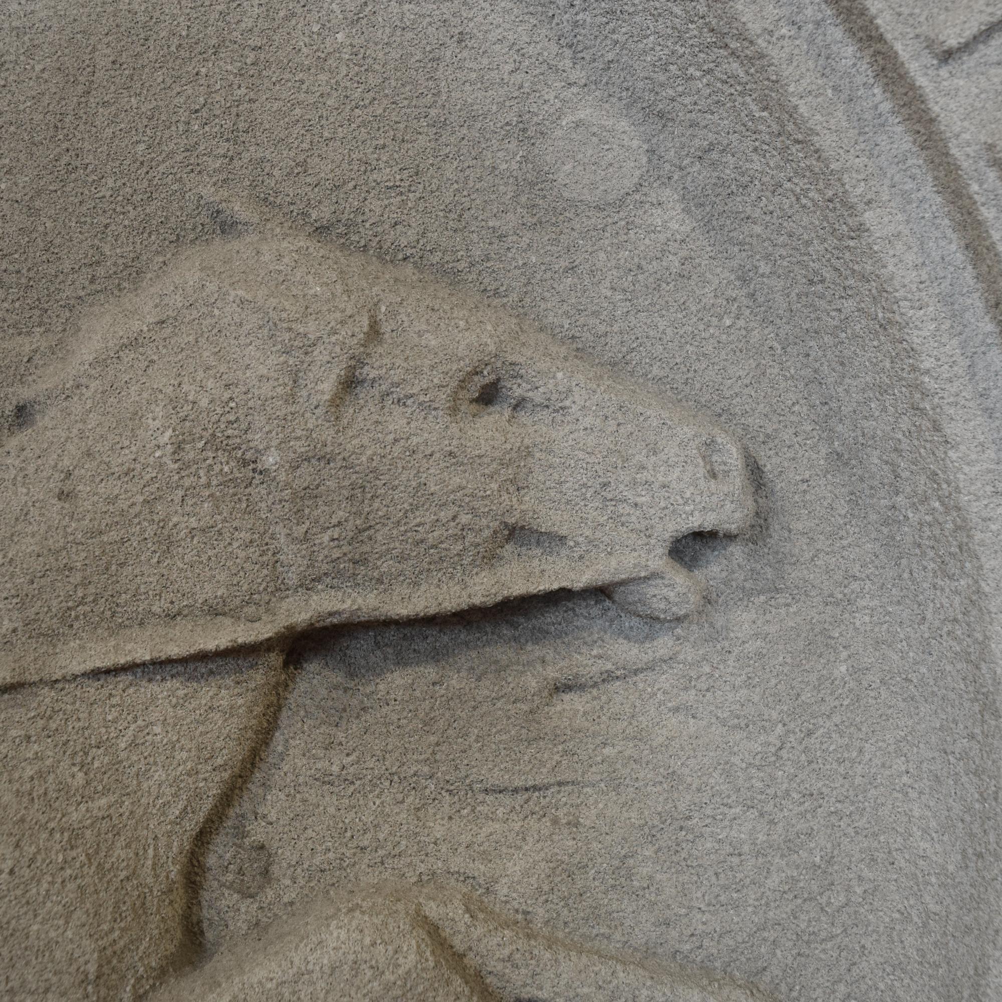 A Carved Limestone Roundel from a Chicago, IL. Post Office Building 37" W x 6" D x 39.5" H — United States, 20th Century