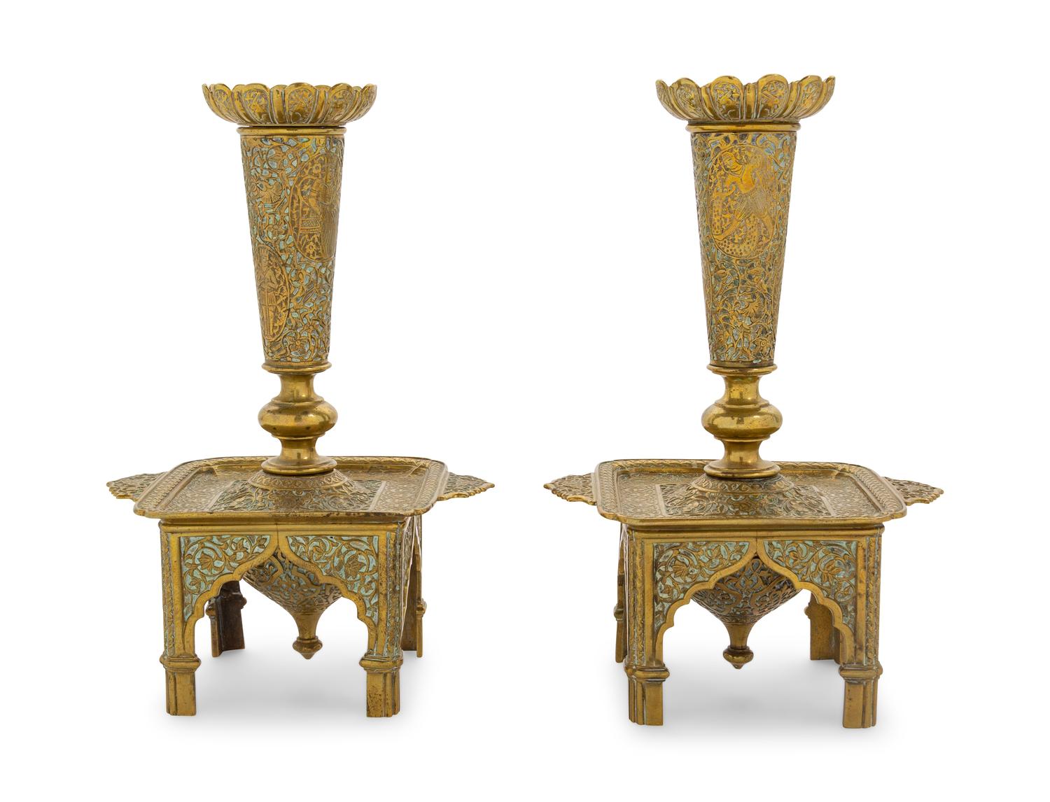 A Pair of Veneto-Saracenic Brass Candlesticks