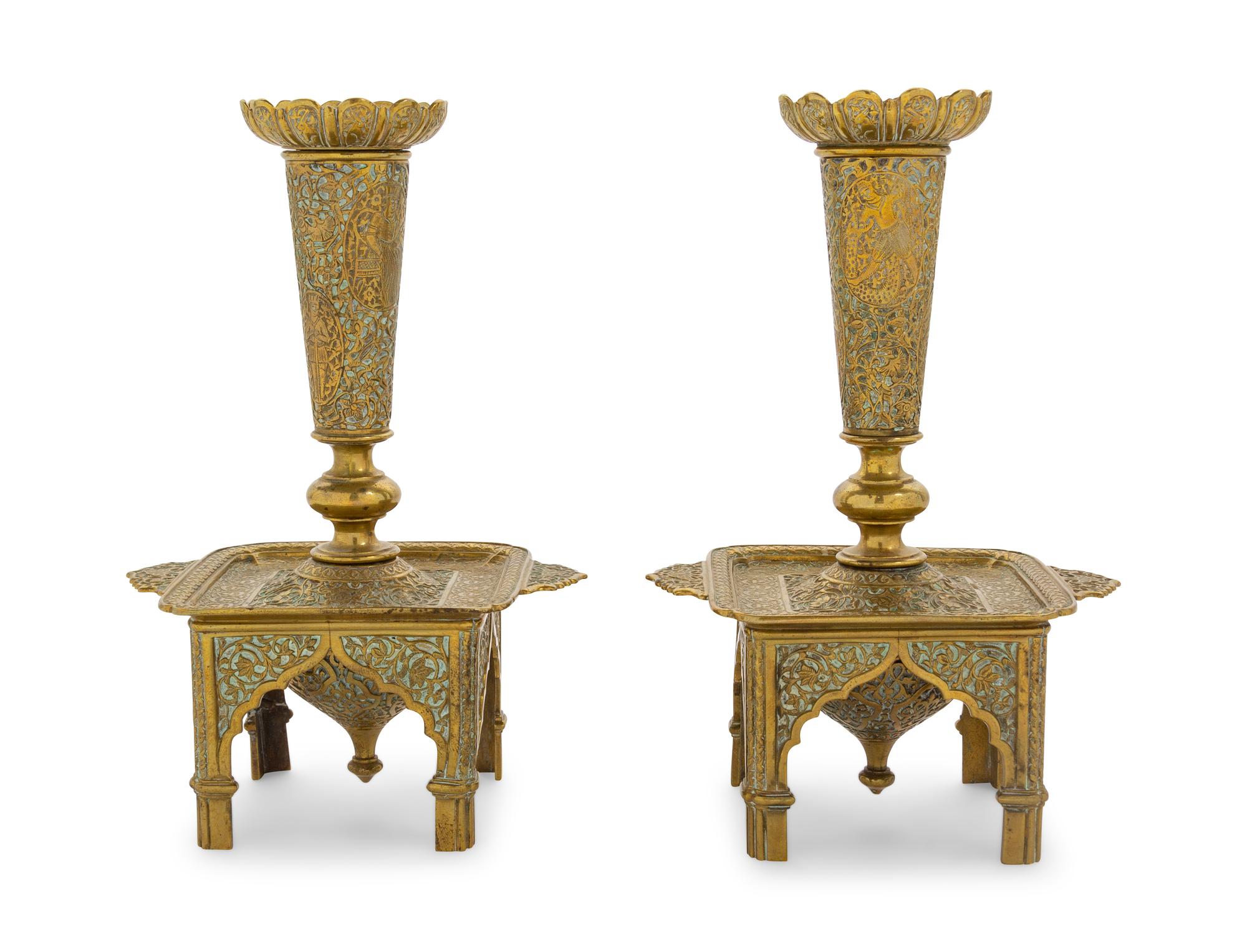 A Pair of Veneto-Saracenic Brass Candlesticks