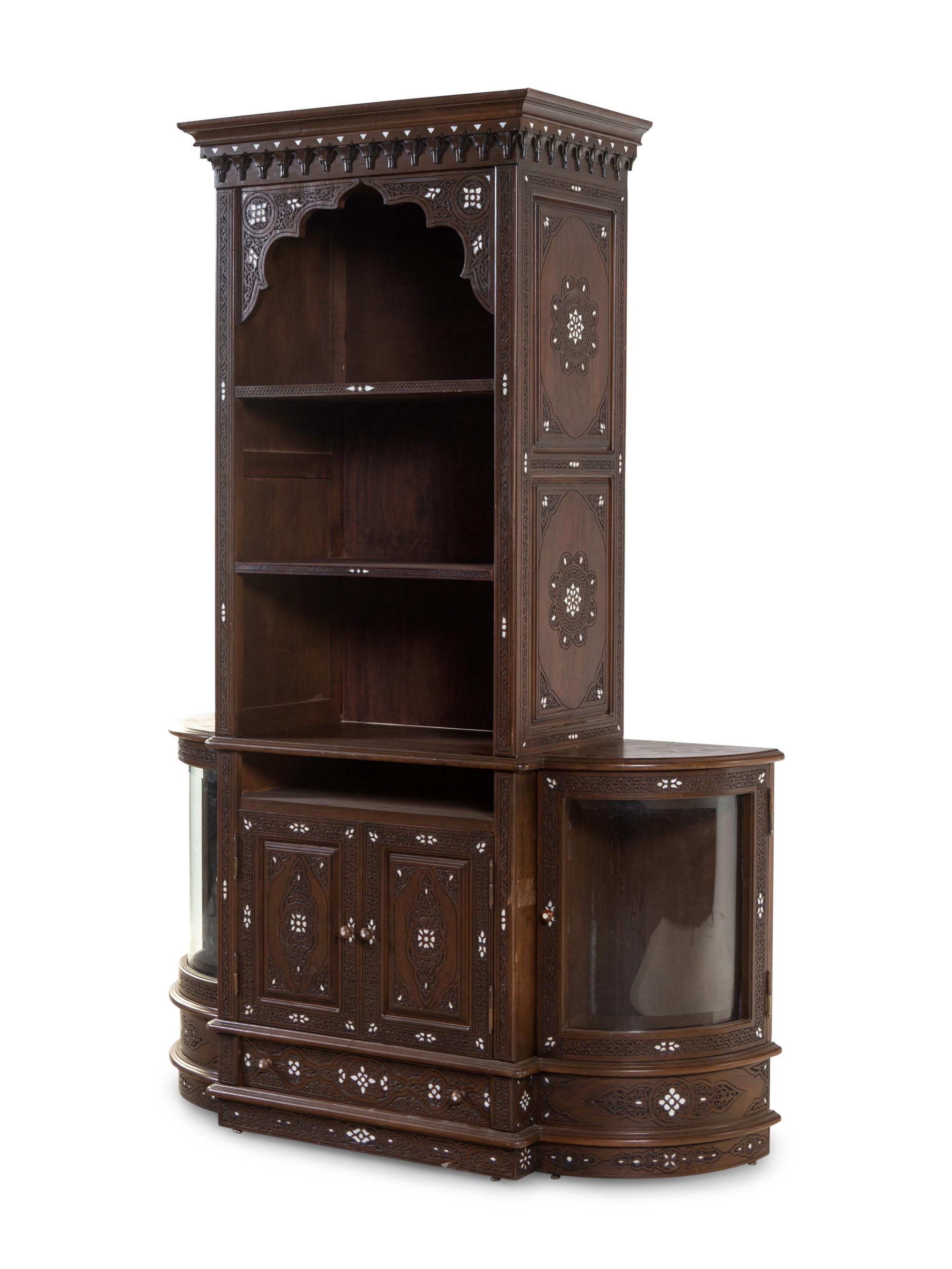 A Syrian Mother-of-Pearl Inlaid and Carved Walnut Bookcase