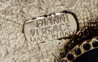 A Gianni Versace Runway Link Suspenders, Length: 37.5".
