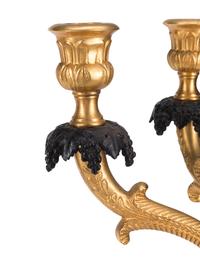 A Pair of French Gilt and Patinated Bronze Figural Six-Light Candelabra
