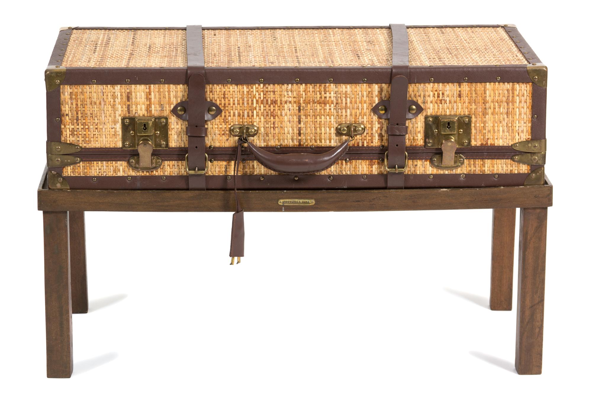 A Contemporary Leather and Brass Mounted Sisal Suitcase on Stand Height 19 1/4 x width 31 x depth 15 3/4 inches. — 20TH CENTURY