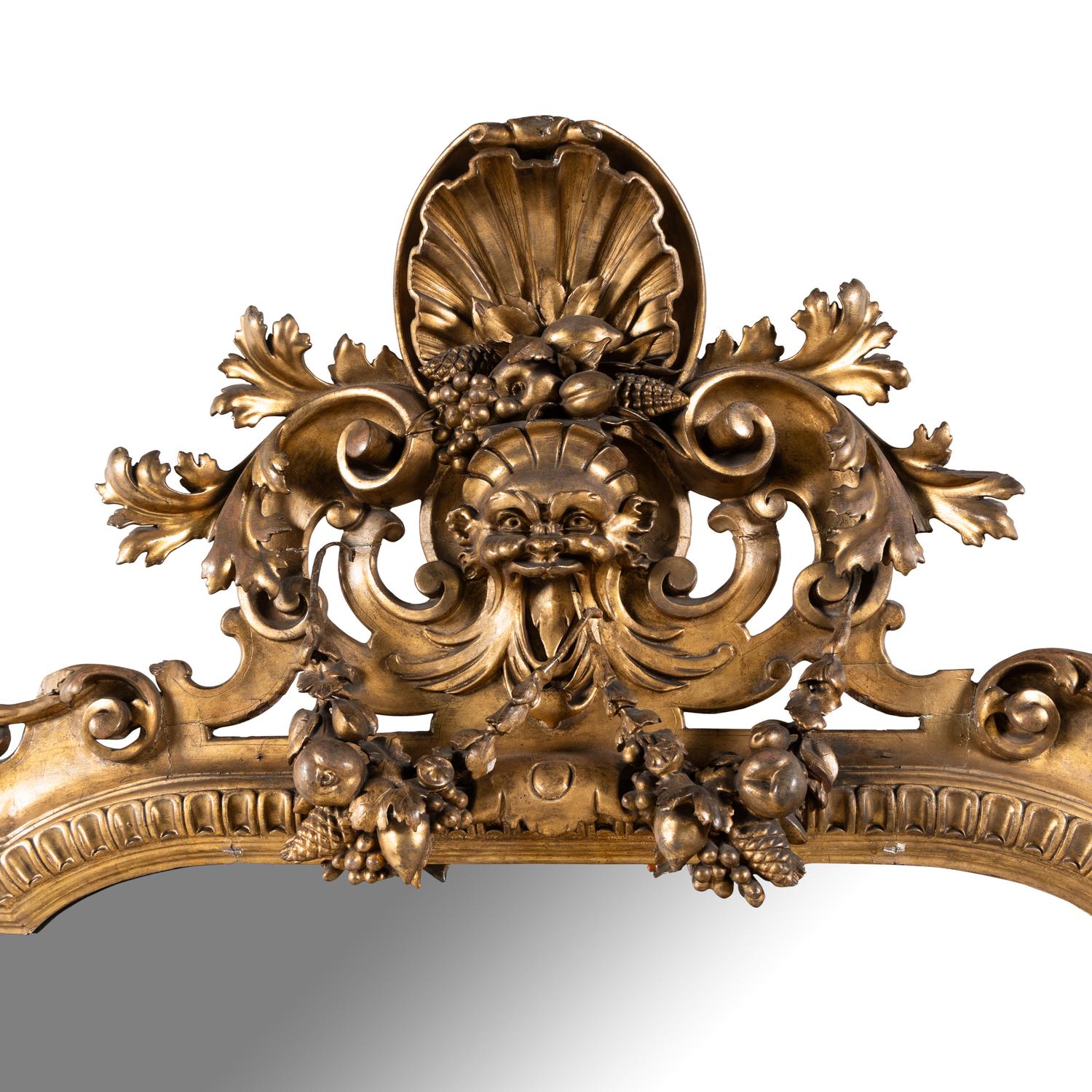 An Italian Baroque Style Giltwood Mirror