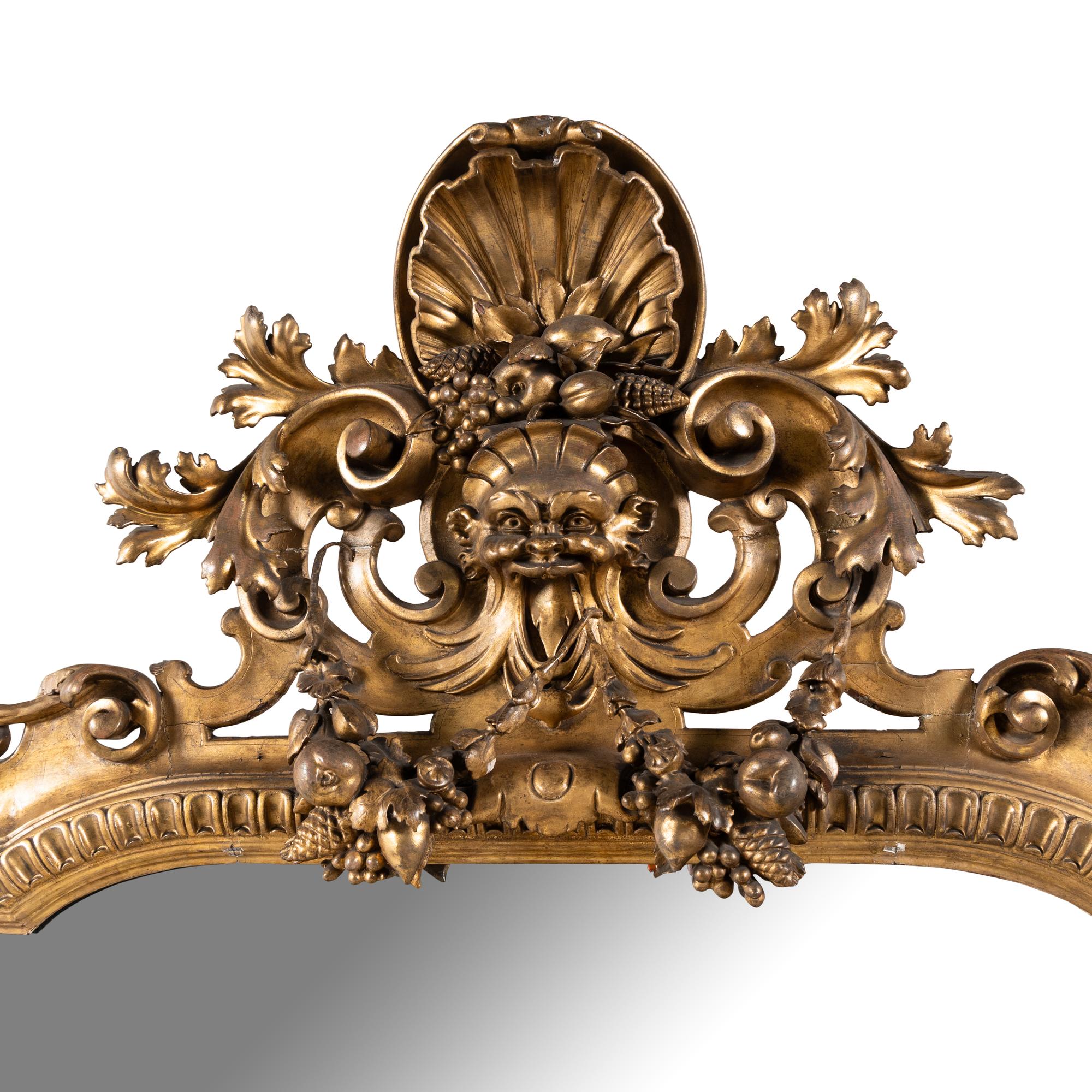 An Italian Baroque Style Giltwood Mirror