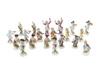 An Assembled Group of Nineteen Sitzendorf Porcelain Monkey Band Figures