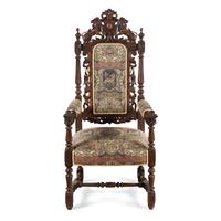 A Renaissance Revival Carved Oak Armchair