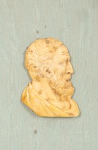 A Pair of Continental Faux Tortoiseshell Painted Framed Composition Plaques of Profile Busts