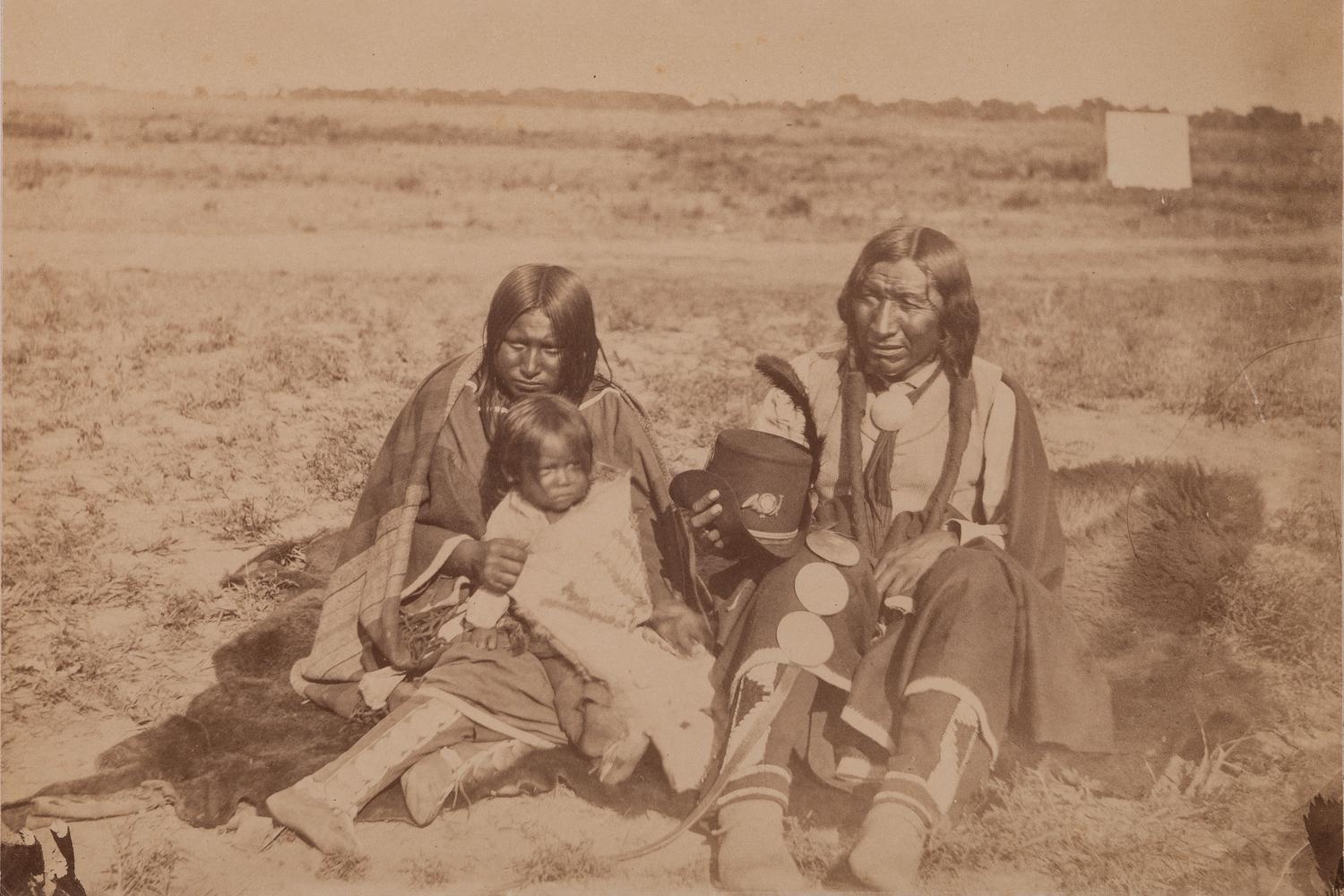 [SOULE, William S. (1836-1908), photographer]. Photograph of Arapahoe warrior, wife, and papoose. Ca 1868-early 1870s.