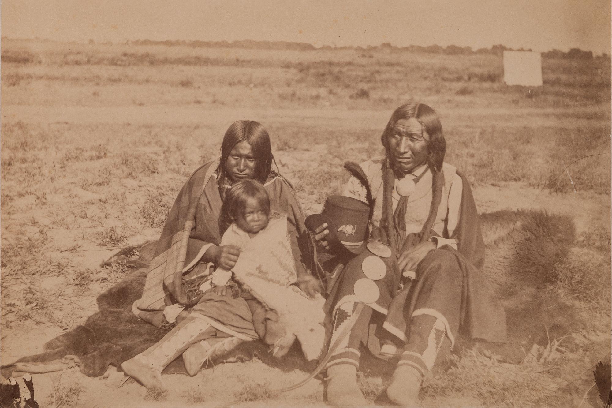 [SOULE, William S. (1836-1908), photographer]. Photograph of Arapahoe warrior, wife, and papoose. Ca 1868-early 1870s.