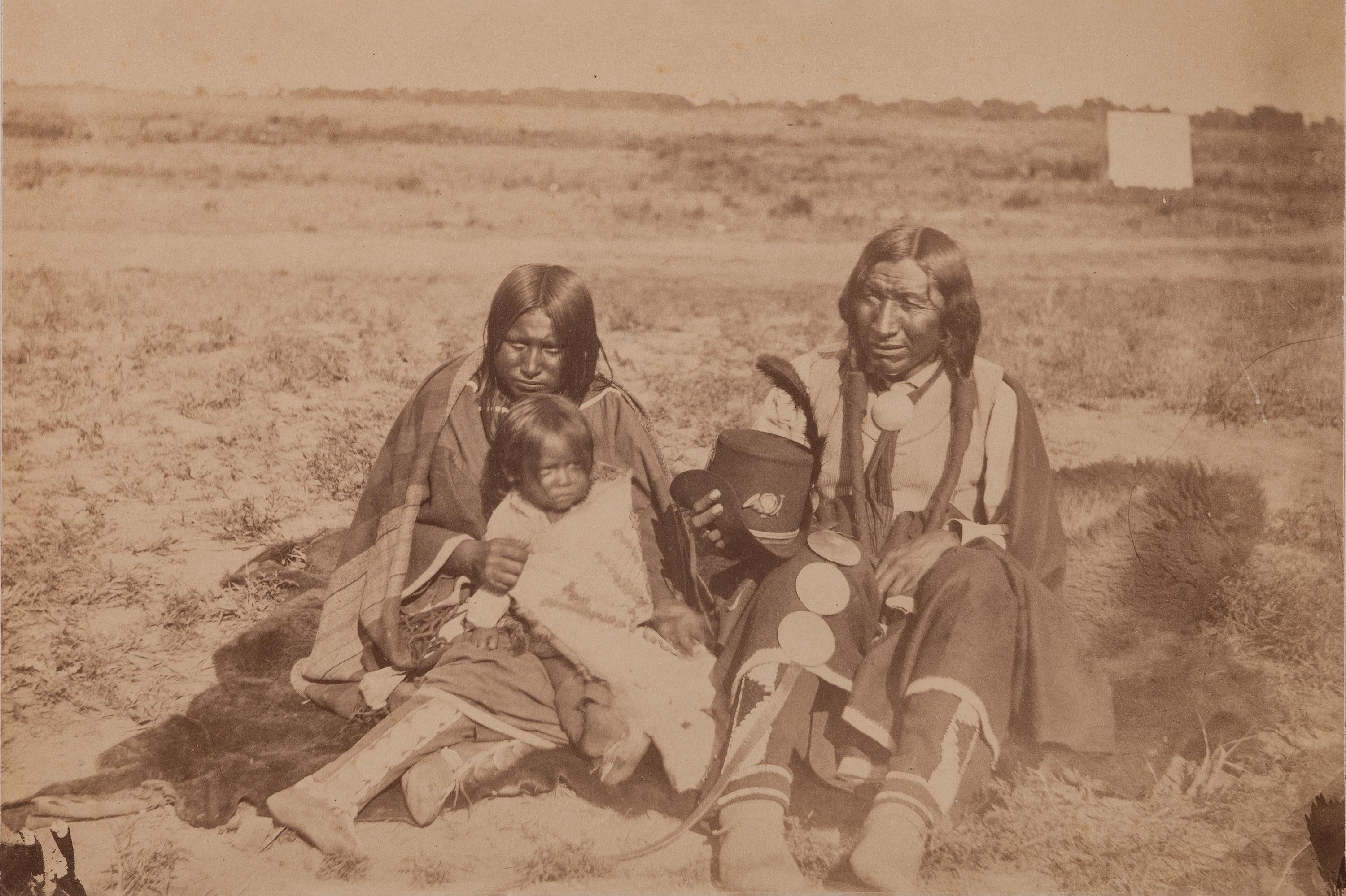 [SOULE, William S. (1836-1908), photographer]. Photograph of Arapahoe warrior, wife, and papoose. Ca 1868-early 1870s.