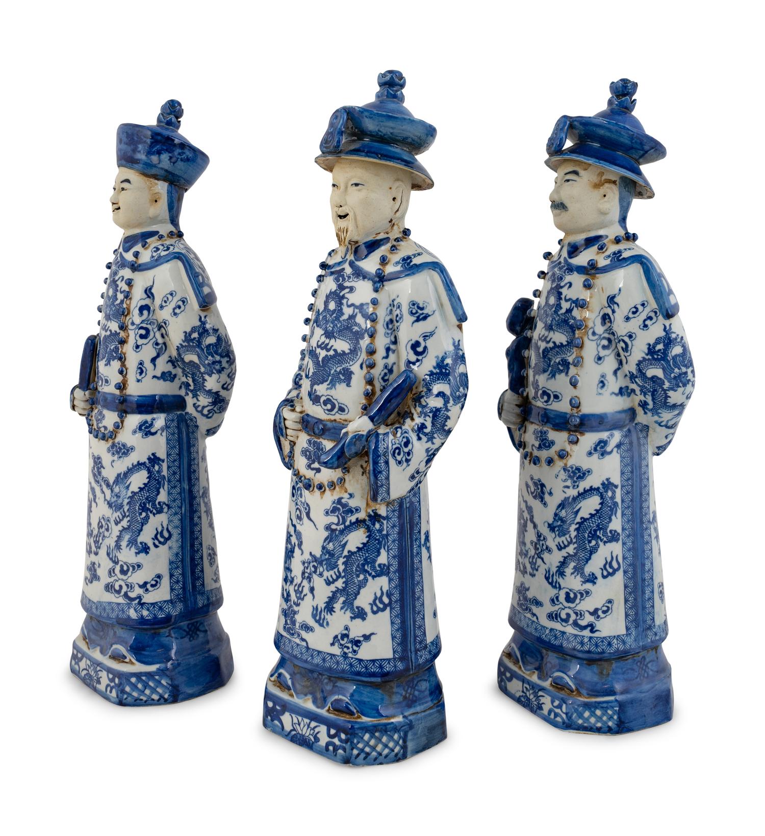 A Group of Three Chinese Blue and White Porcelain Figures of Officials — 20TH CENTURY