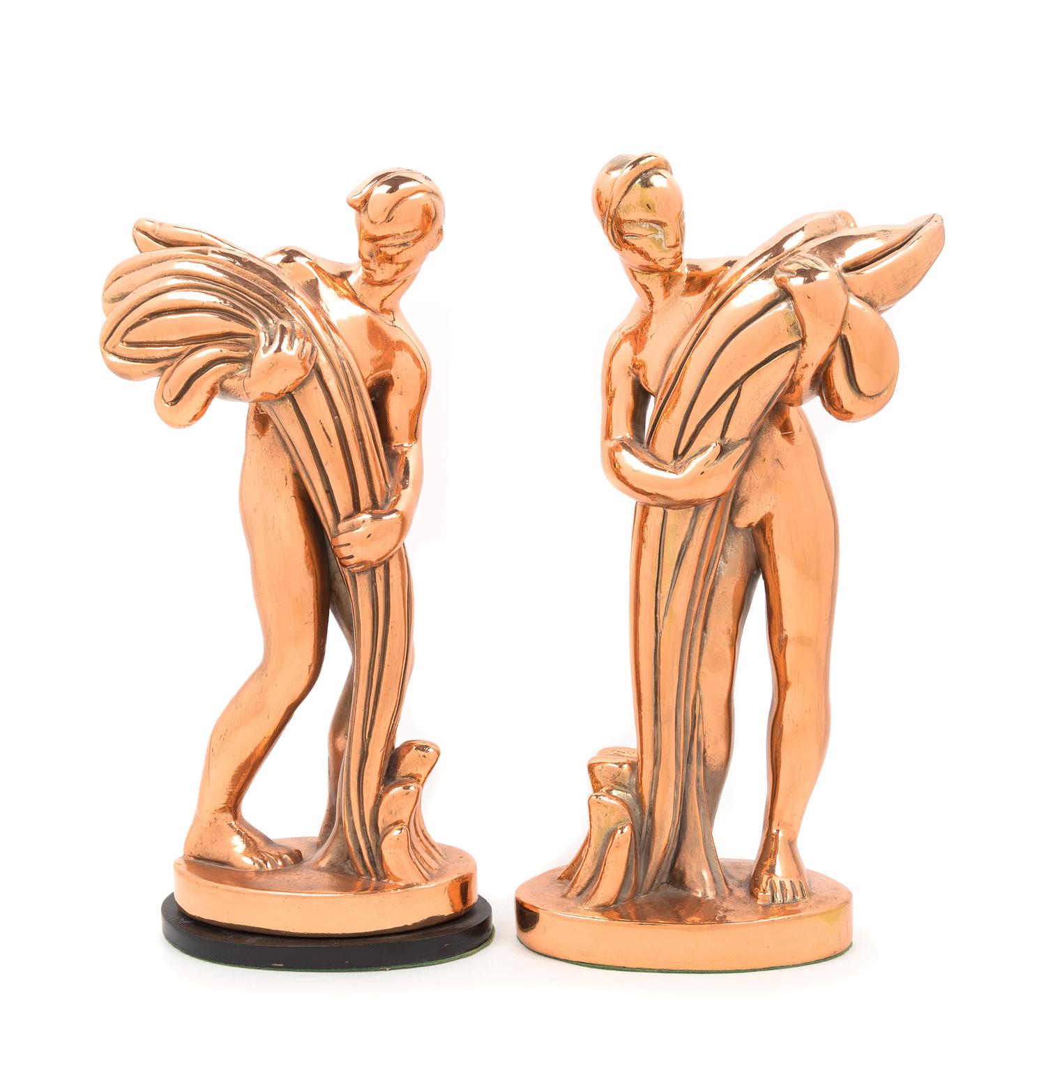 Art Deco, FIRST HALF 20TH CENTURY, a pair of copper clad figures