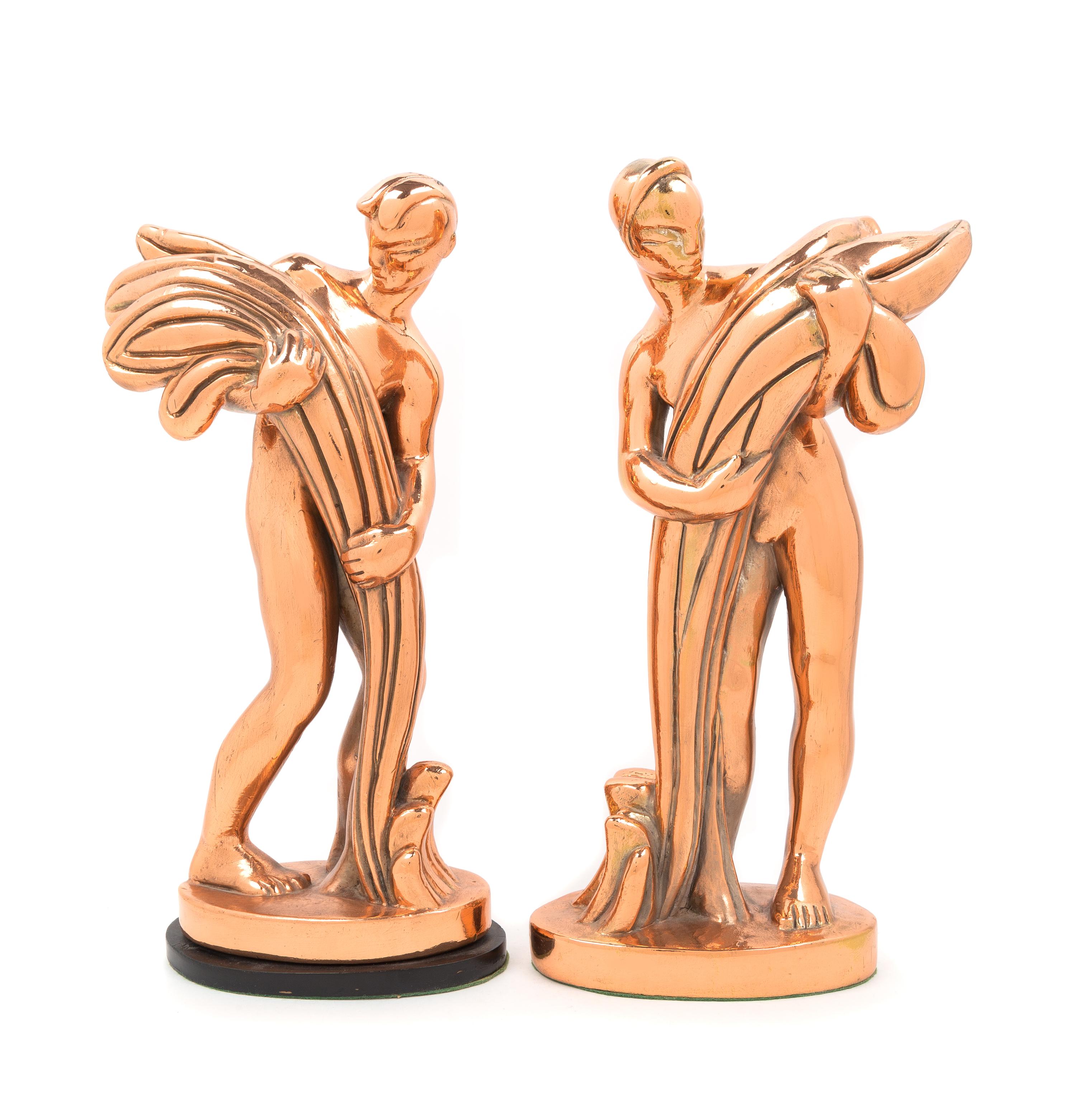 Art Deco, FIRST HALF 20TH CENTURY, a pair of copper clad figures