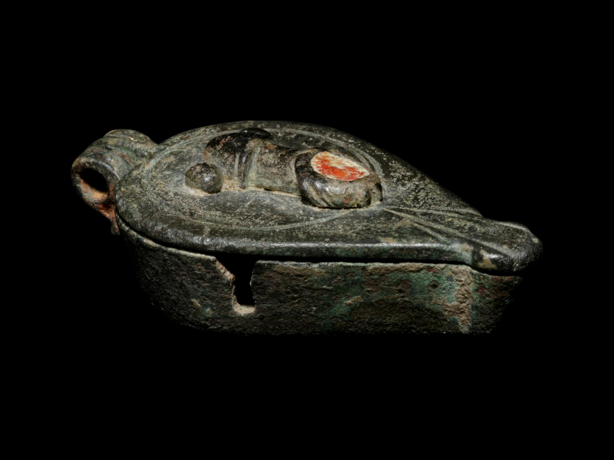 A Late Roman Bronze and Enamel Pendant with Phallic Symbols