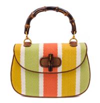 A Gucci Brown Leather and Woven Bamboo Top Handle Handbag, 10.5" x 7" x 3".