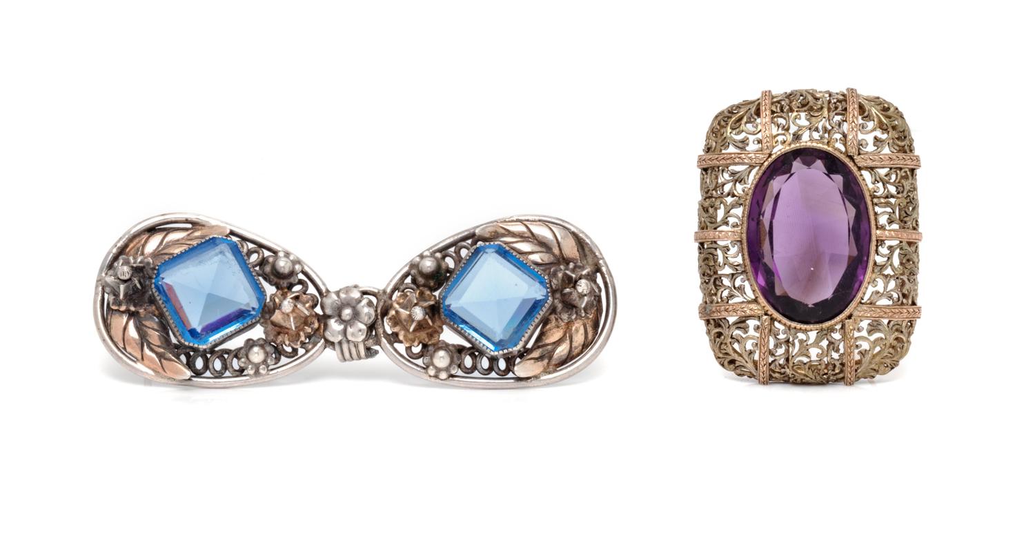 A Collection of Silver and Gold Brooches,
