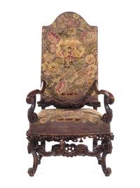 A William and Mary Style Carved Walnut Armchair with Needlepoint Upholstery